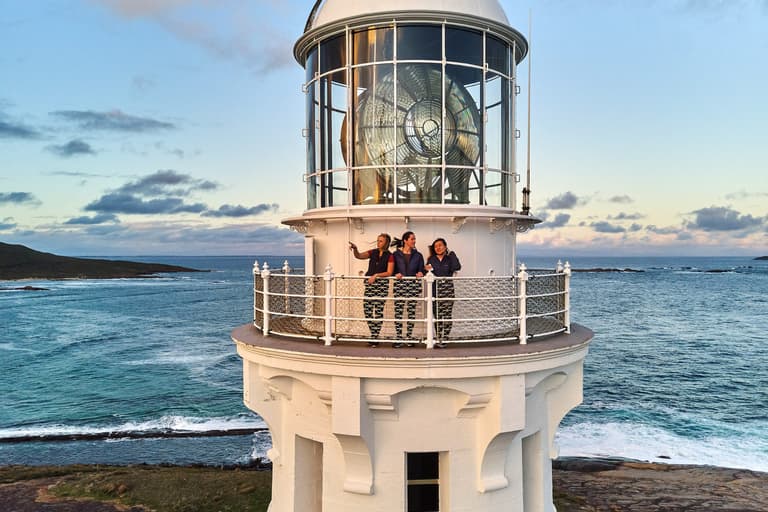 People standing on the balcony of Cape Leeuwin Lighthouse