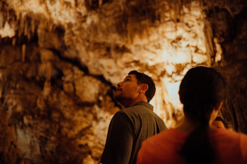 People inside Ngilgi Cave